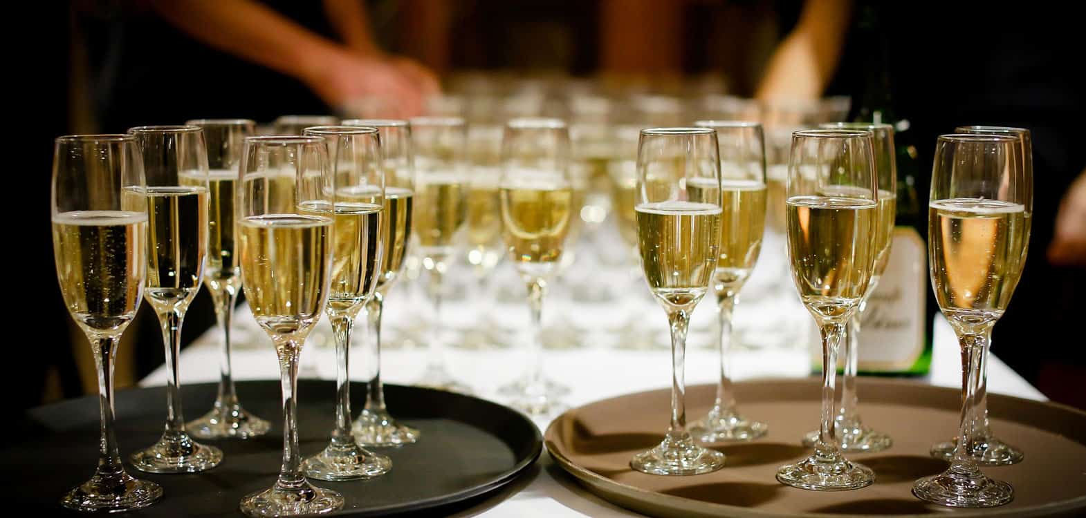 Champagne glasses prepared for wedding guests at Branxholm Park